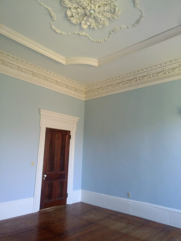 Historical Greek Revival blue color painted room