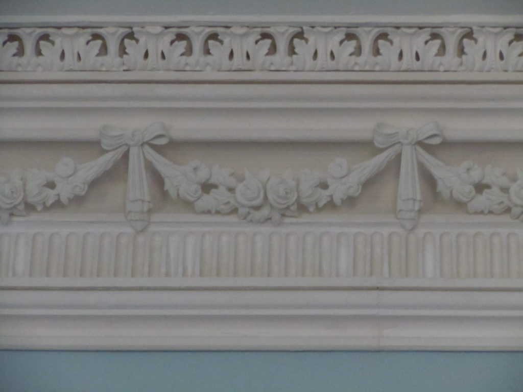 Close up of the detail of the dining room plaster cornice.