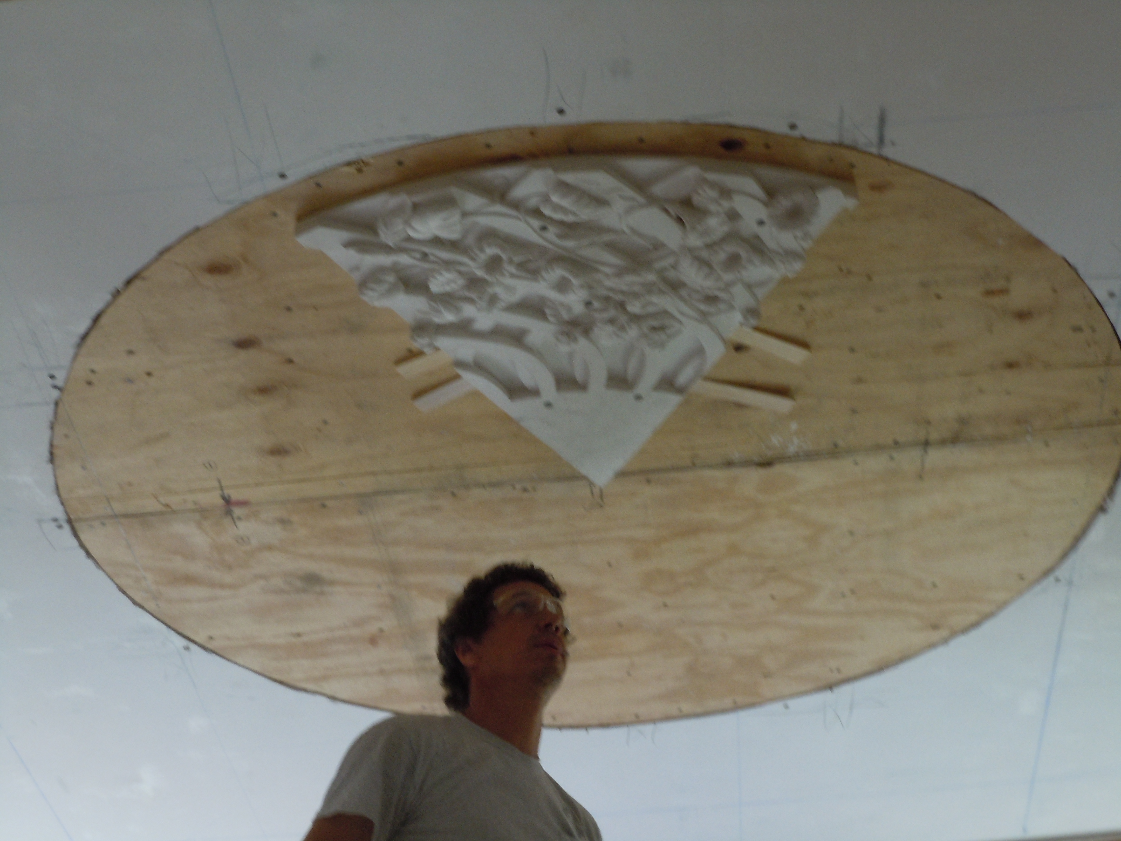 Greg Jacobs of Land mark Preservation working on securing the heavy plaster medallion in Glen Mary’s front room- July 2018