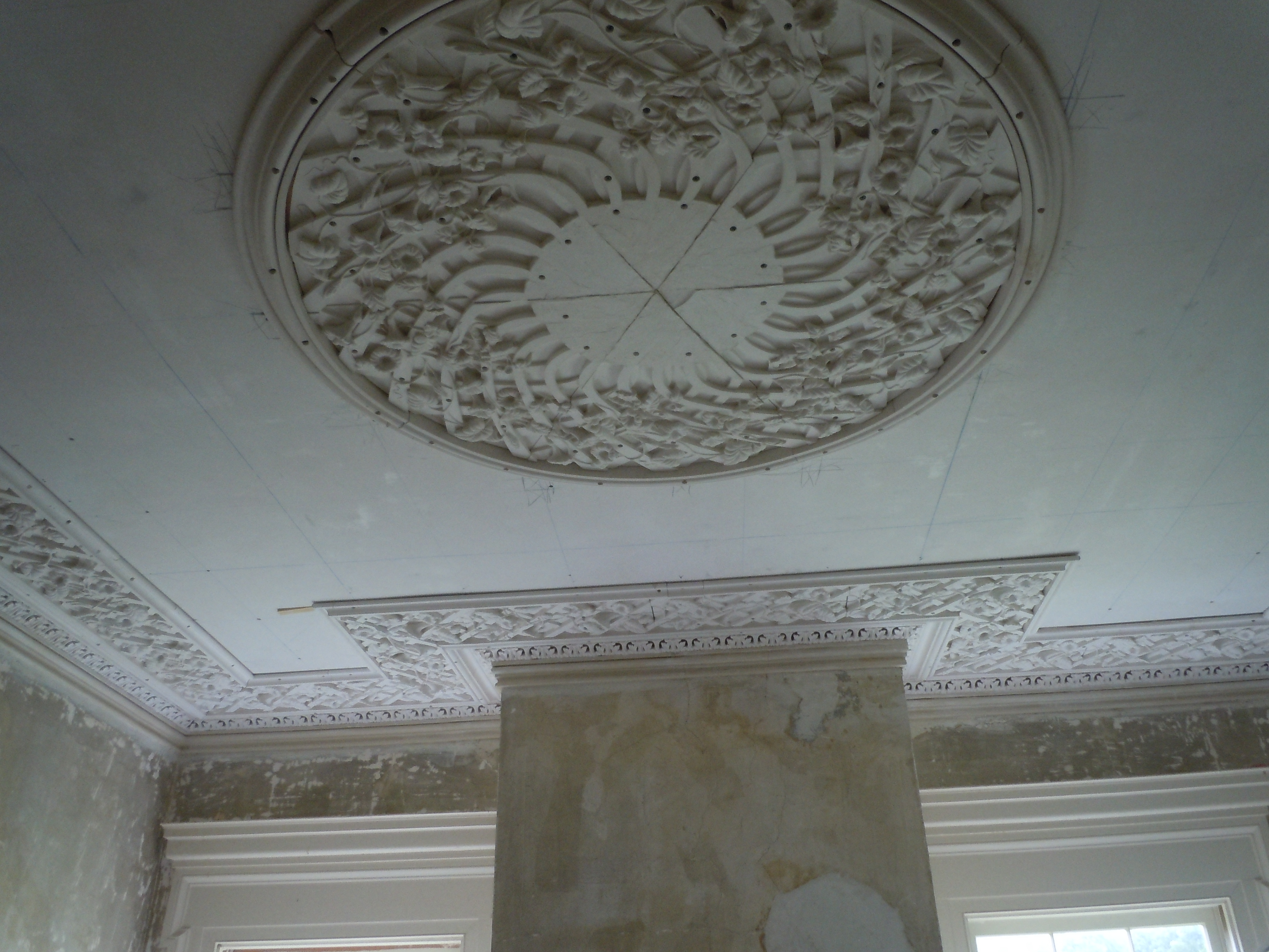  Lattice perimeter and partially installed center medallion in the front room.