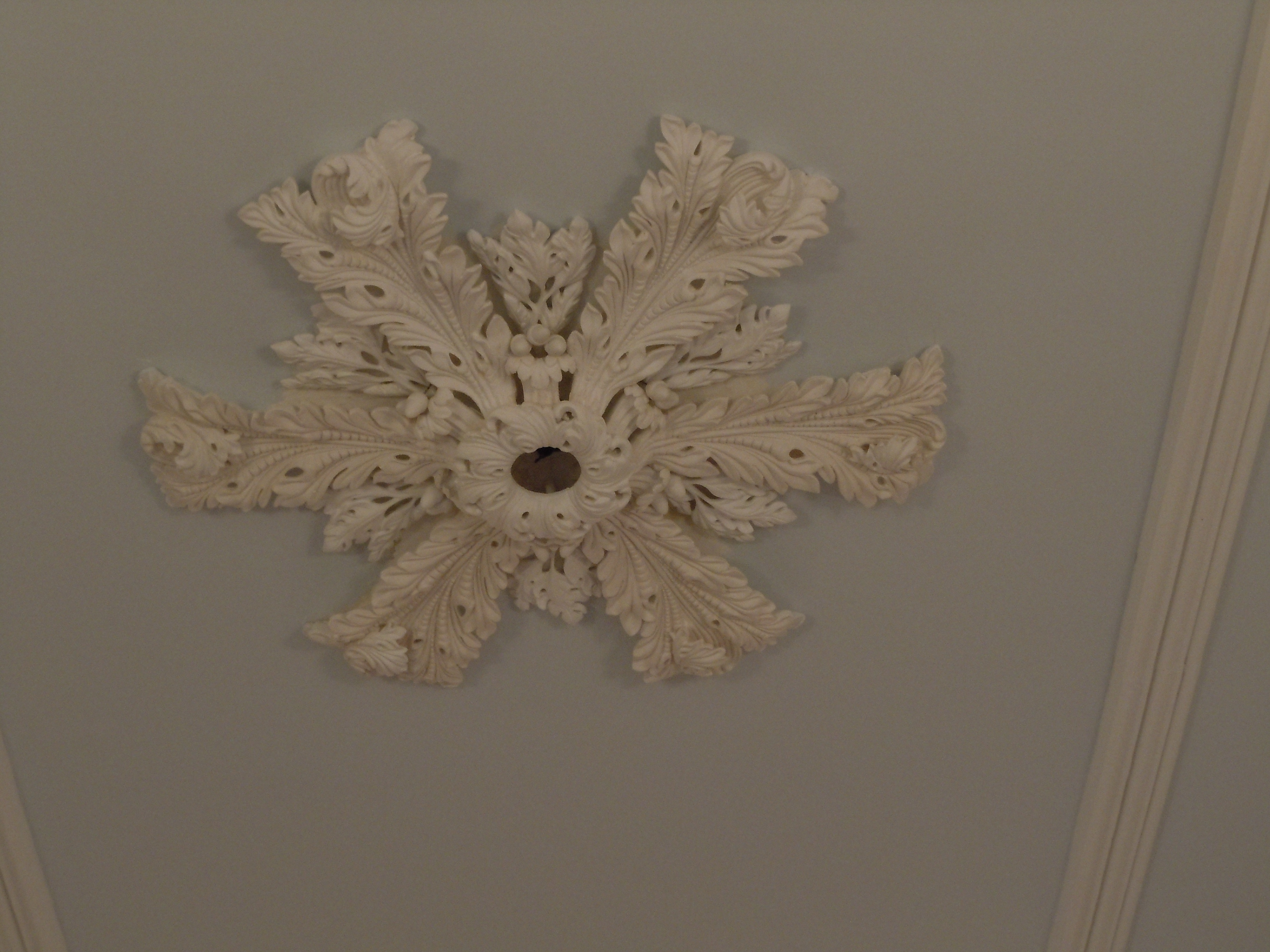 Lateral ceiling medallion upstairs hallway.