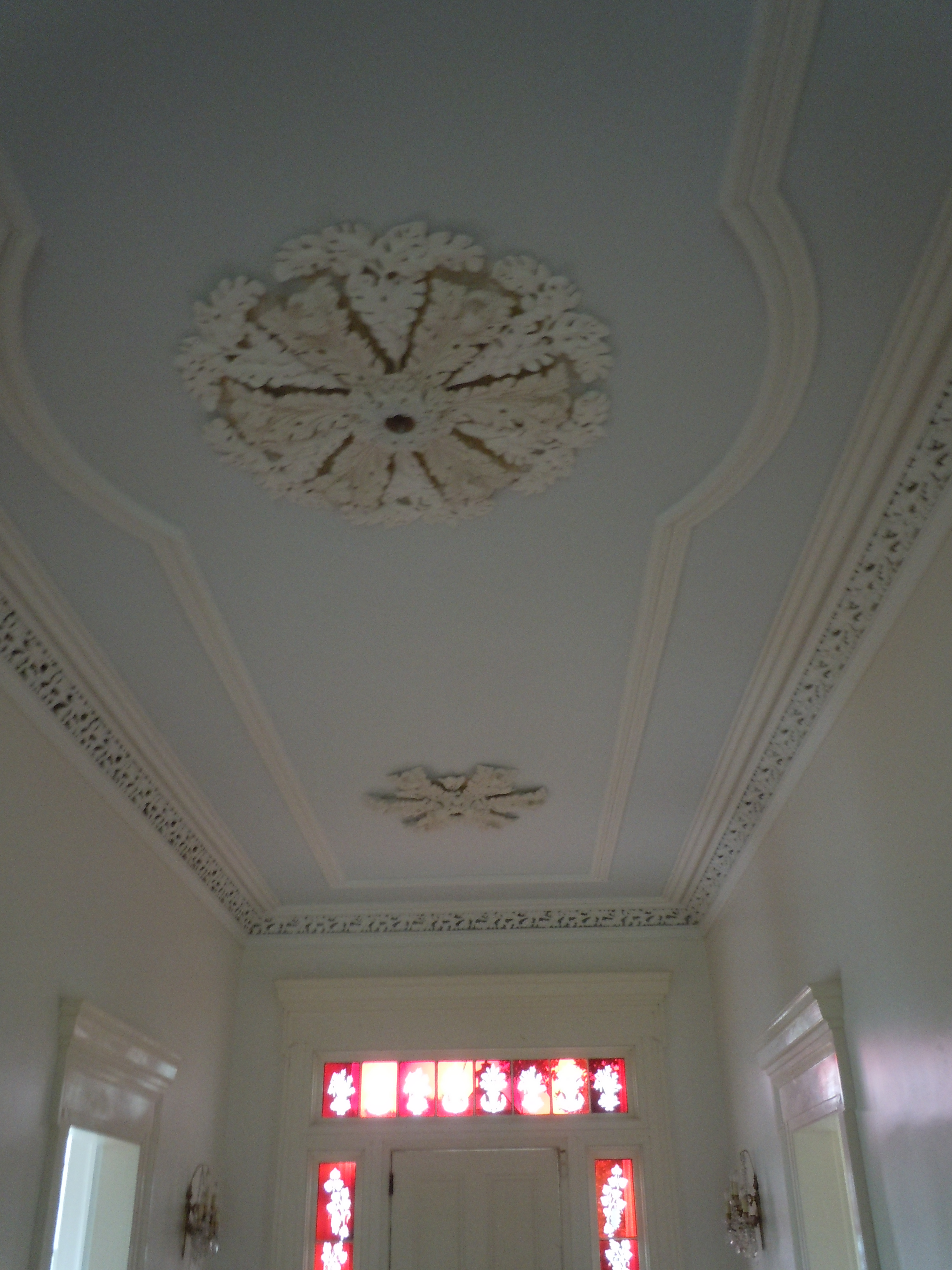  Partial view of Upstairs hallways showing two of three ceiling medallions. The lateral medallions are the same design.